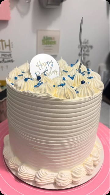 A decorated AlmaBites celebration cake